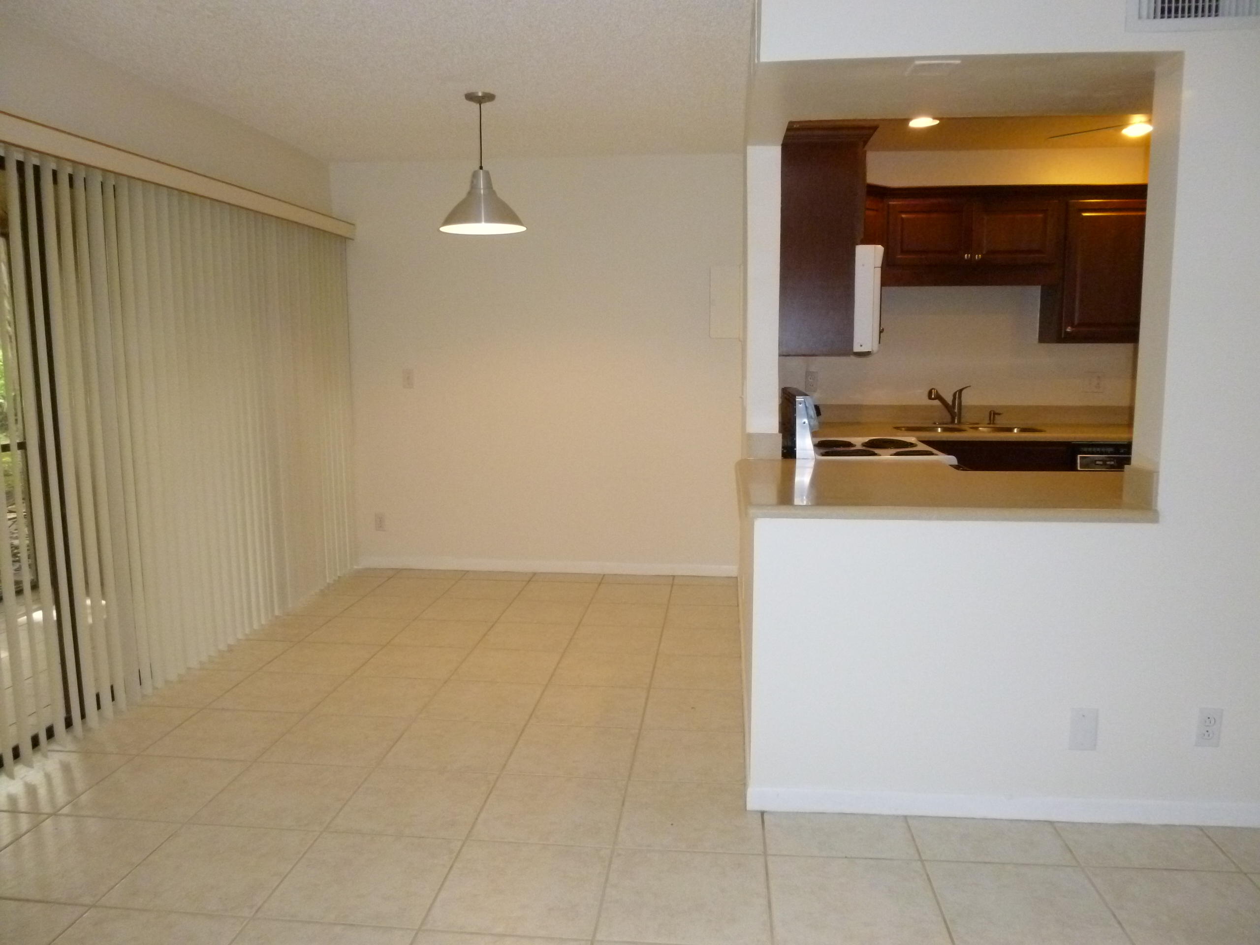 1069 Northwest 13th Street, Unit 2 Boca Raton, FL 33486 - Photo 9 of 35 Dining / Kitchen