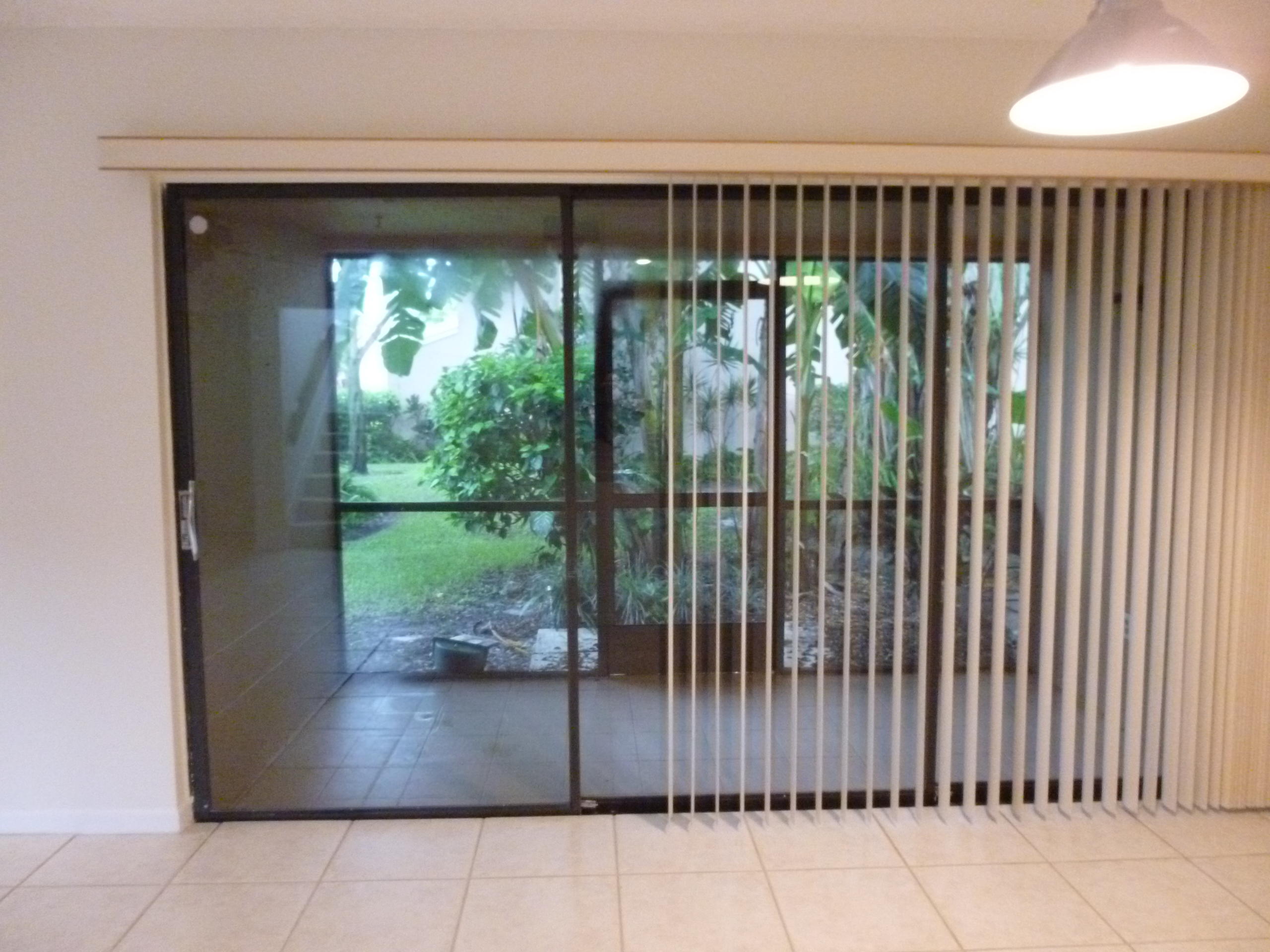 1069 Northwest 13th Street, Unit 2 Boca Raton, FL 33486 - Photo 10 of 35 Patio from dining room