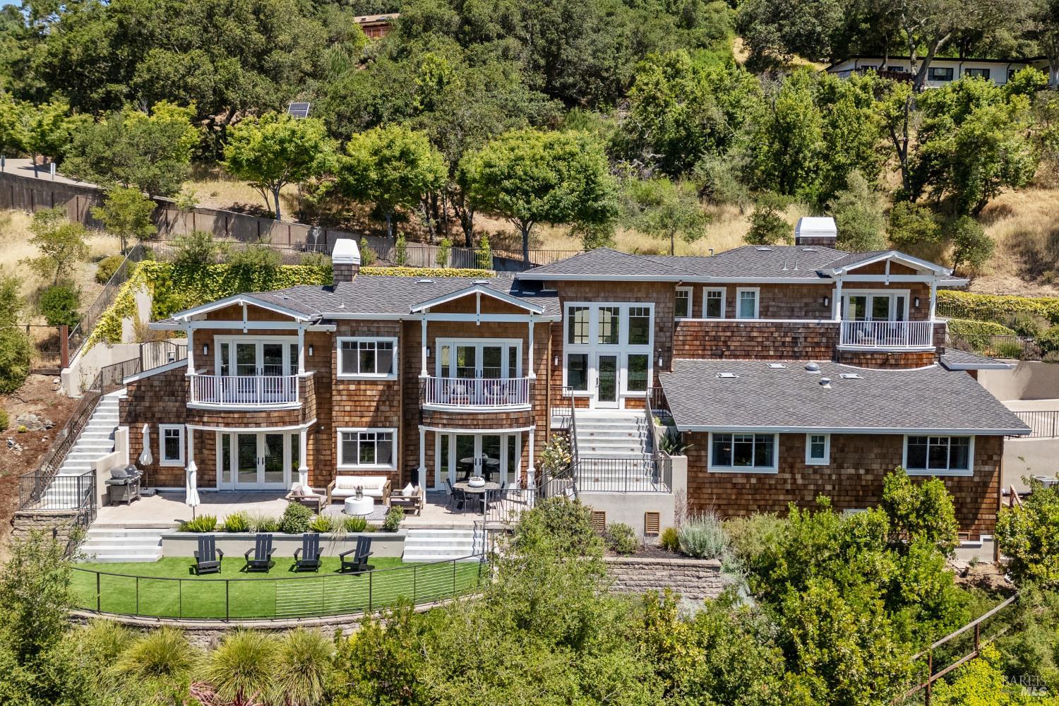 front view of a house with a garden