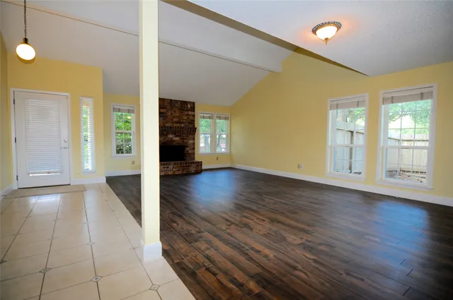a view of a livingroom with wooden floor