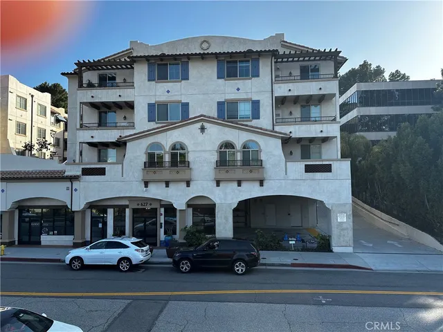 a car parked in front of a building
