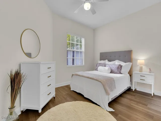 a bedroom with a bed and a closet