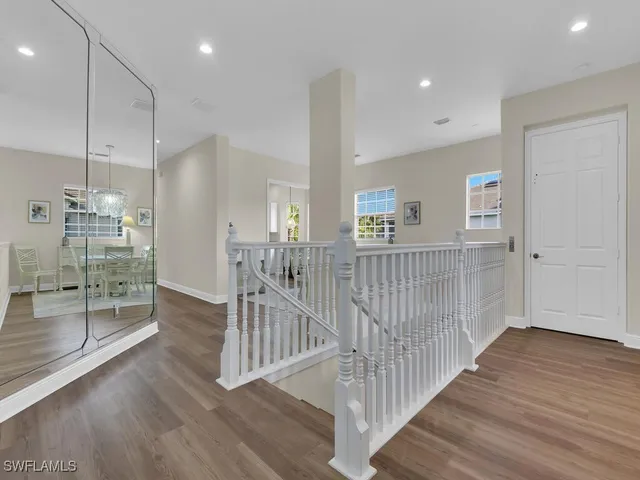 a view of entryway with wooden floor
