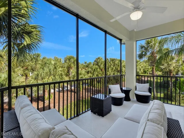 a balcony with chairs