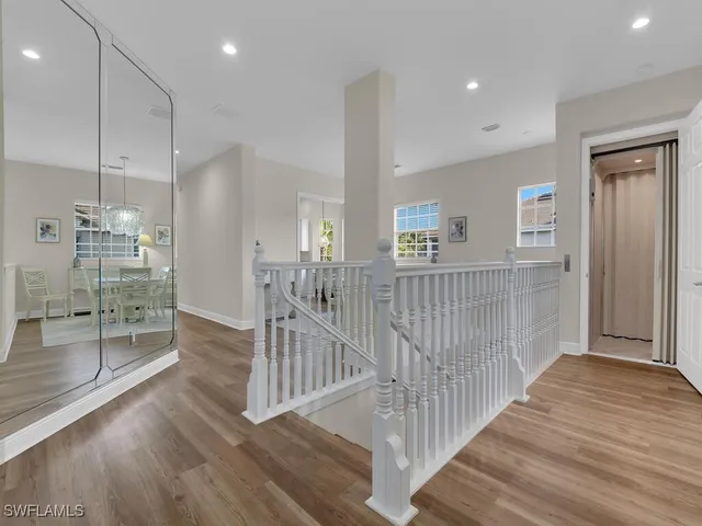 a view of entryway with wooden floor