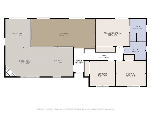 a view of a kitchen with a sink and a refrigerator
