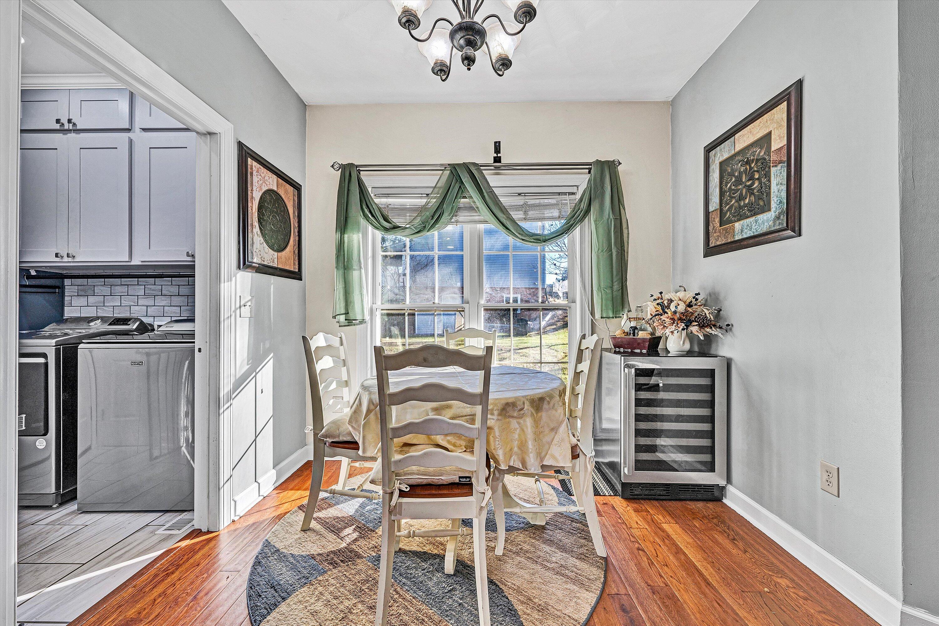 207 Overlook Road Vinton, VA 24179 - Photo 11 of 65 a view of a dining room with furniture window and wooden floor