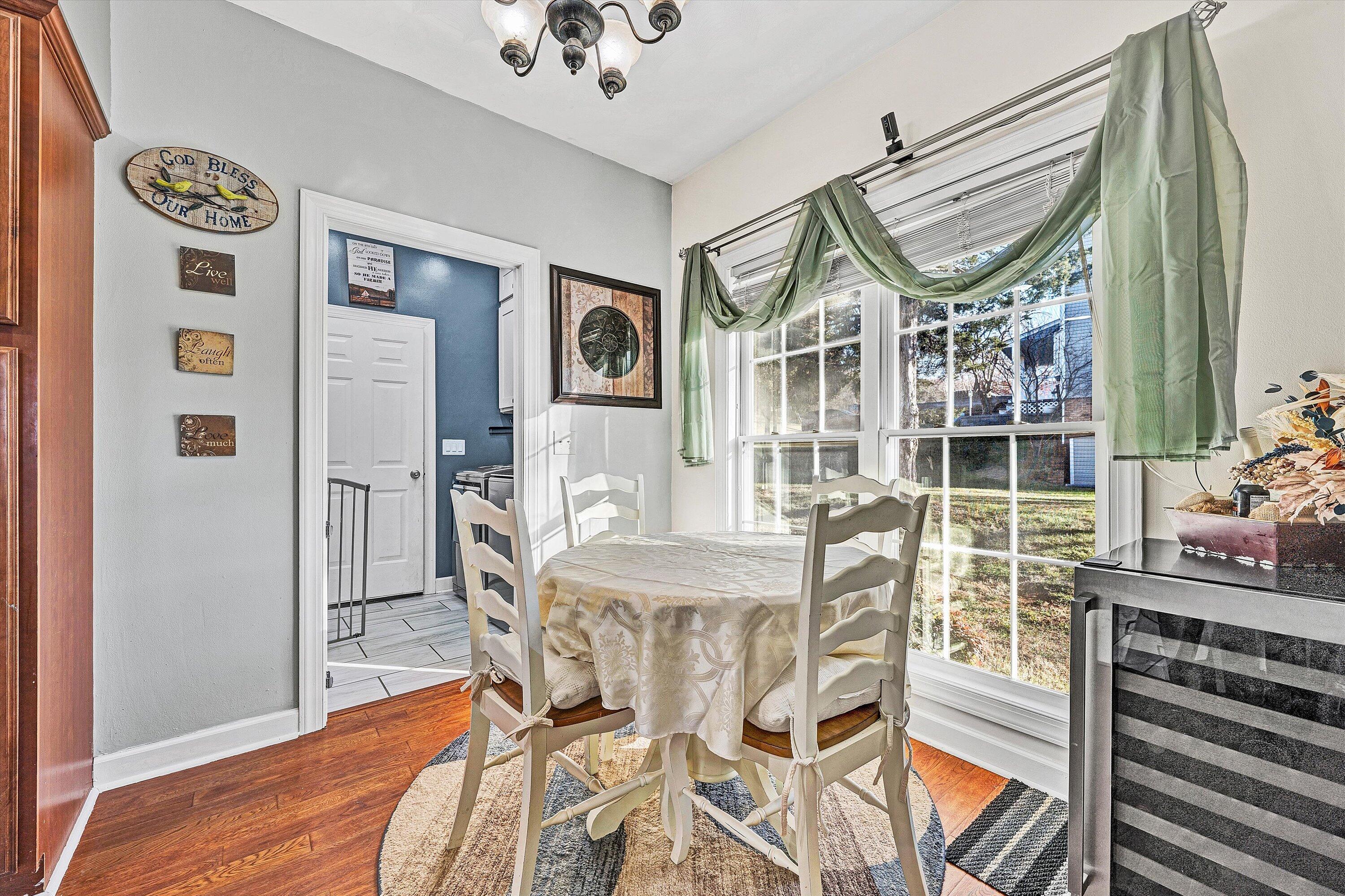 207 Overlook Road Vinton, VA 24179 - Photo 12 of 65 a view of a dining room with furniture window and wooden floor