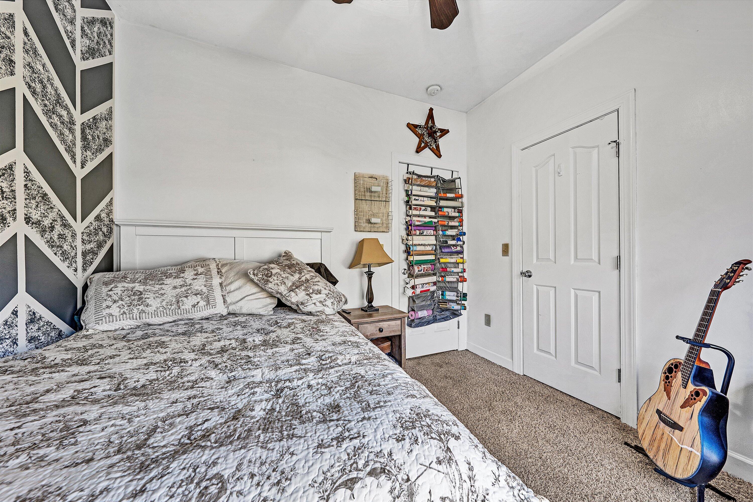 207 Overlook Road Vinton, VA 24179 - Photo 22 of 65 a bedroom with a large bed and a window