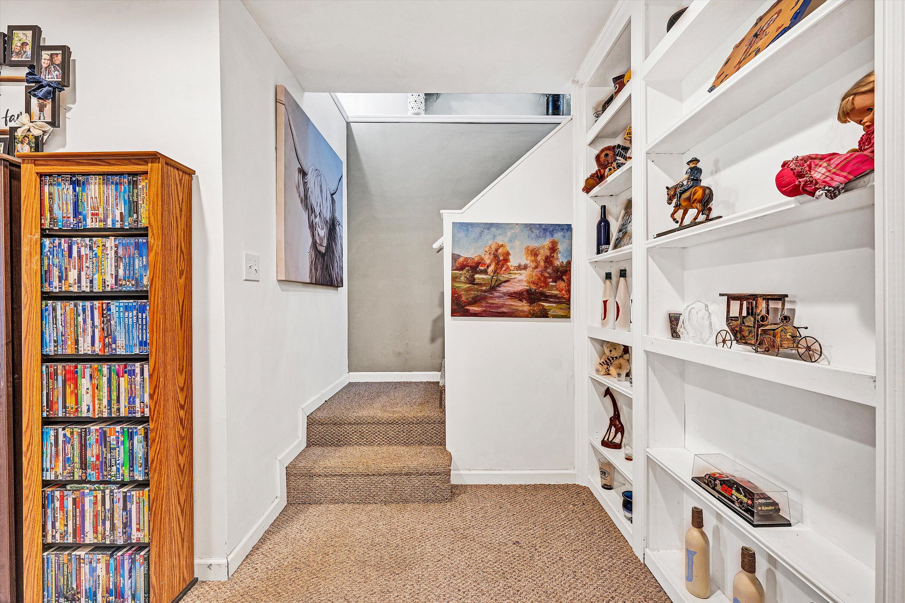 207 Overlook Road Vinton, VA 24179 - Photo 28 of 65 a view of an entryway with lots of frames on the wall and a window