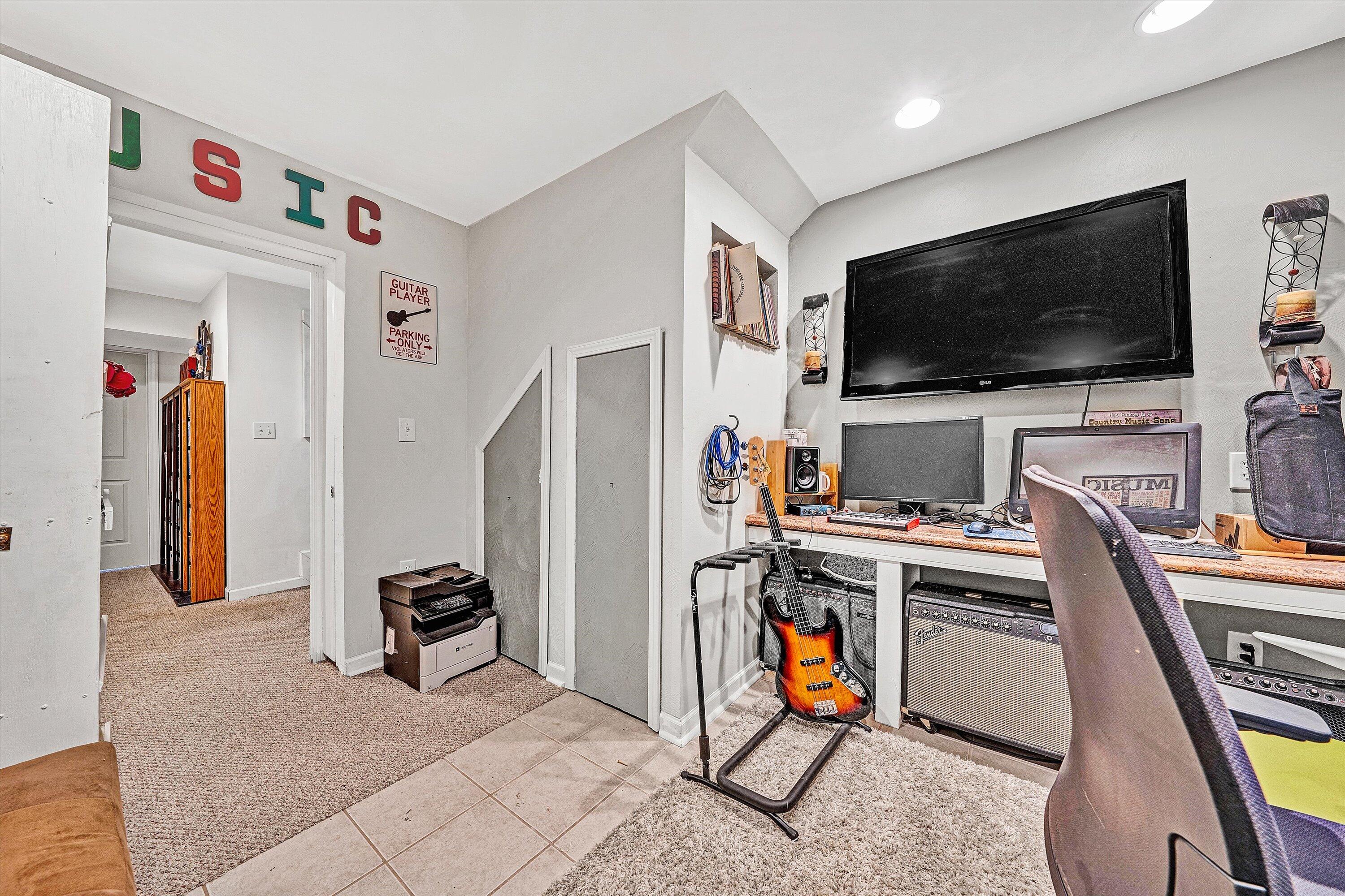 207 Overlook Road Vinton, VA 24179 - Photo 32 of 65 a view of a livingroom with furniture and a flat screen tv