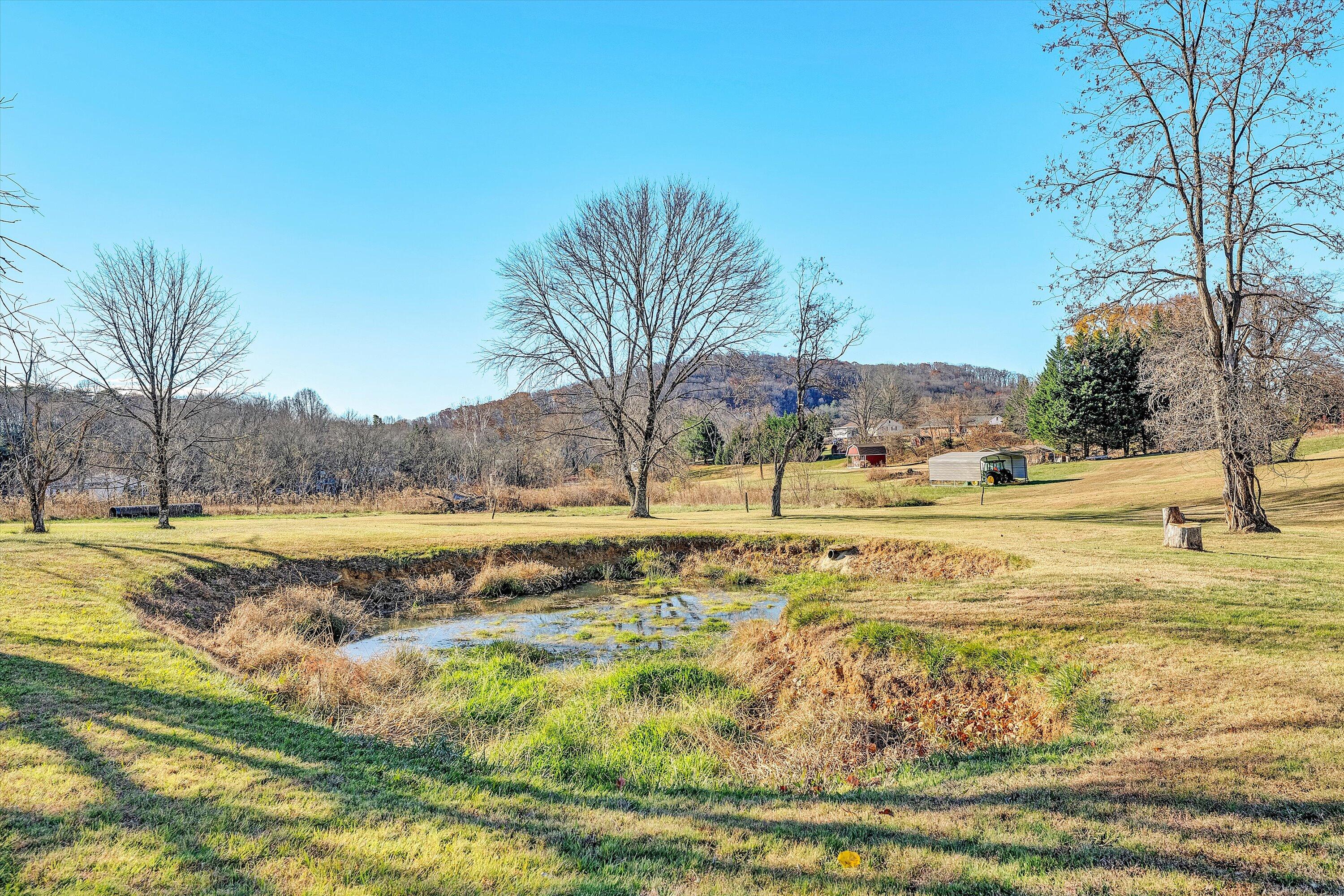 207 Overlook Road Vinton, VA 24179 - Photo 61 of 65 a view of a swimming pool with an outdoor space and seating area