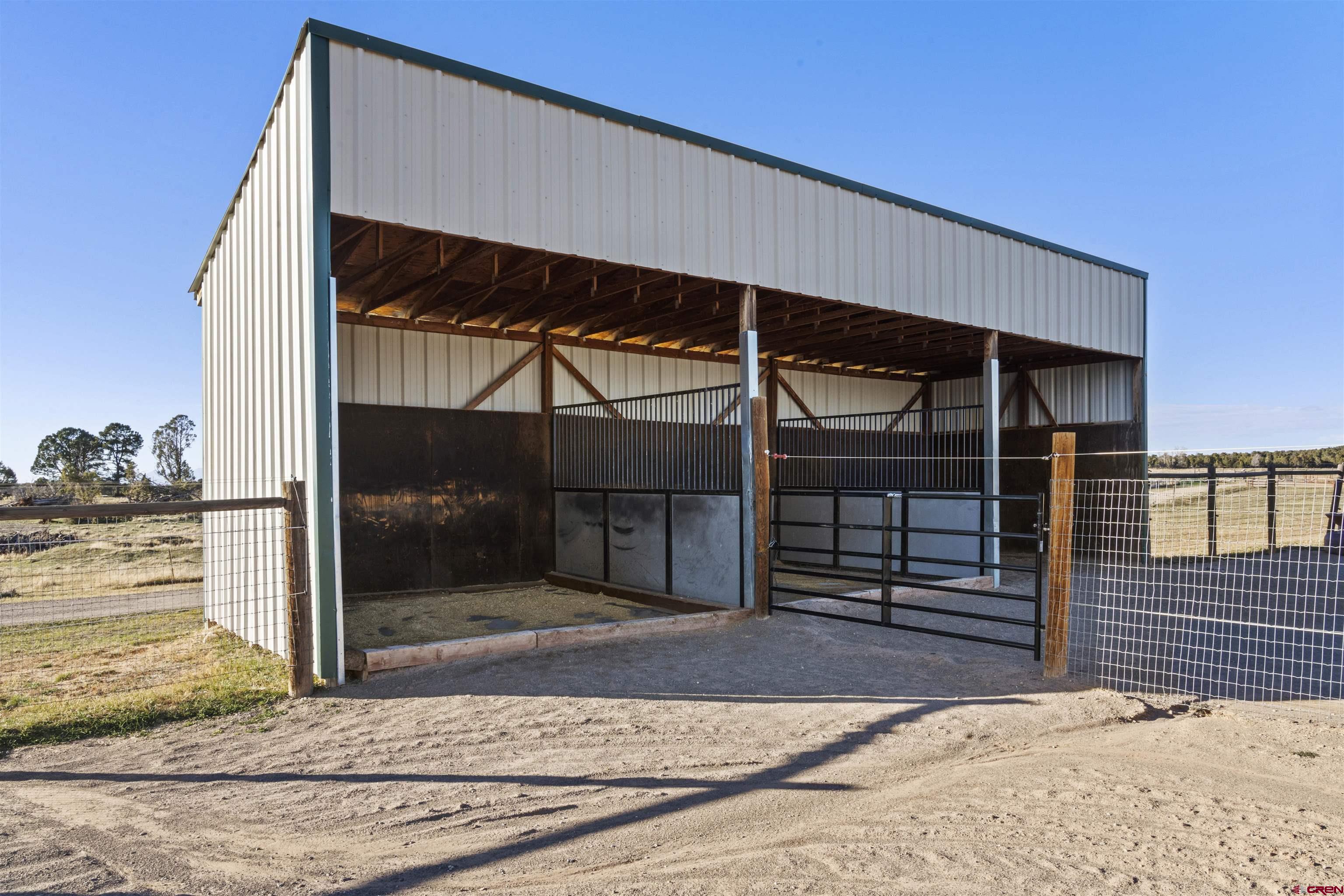 1302 42zn Road Norwood, CO 81423 - Photo 18 of 32 a view of a porch
