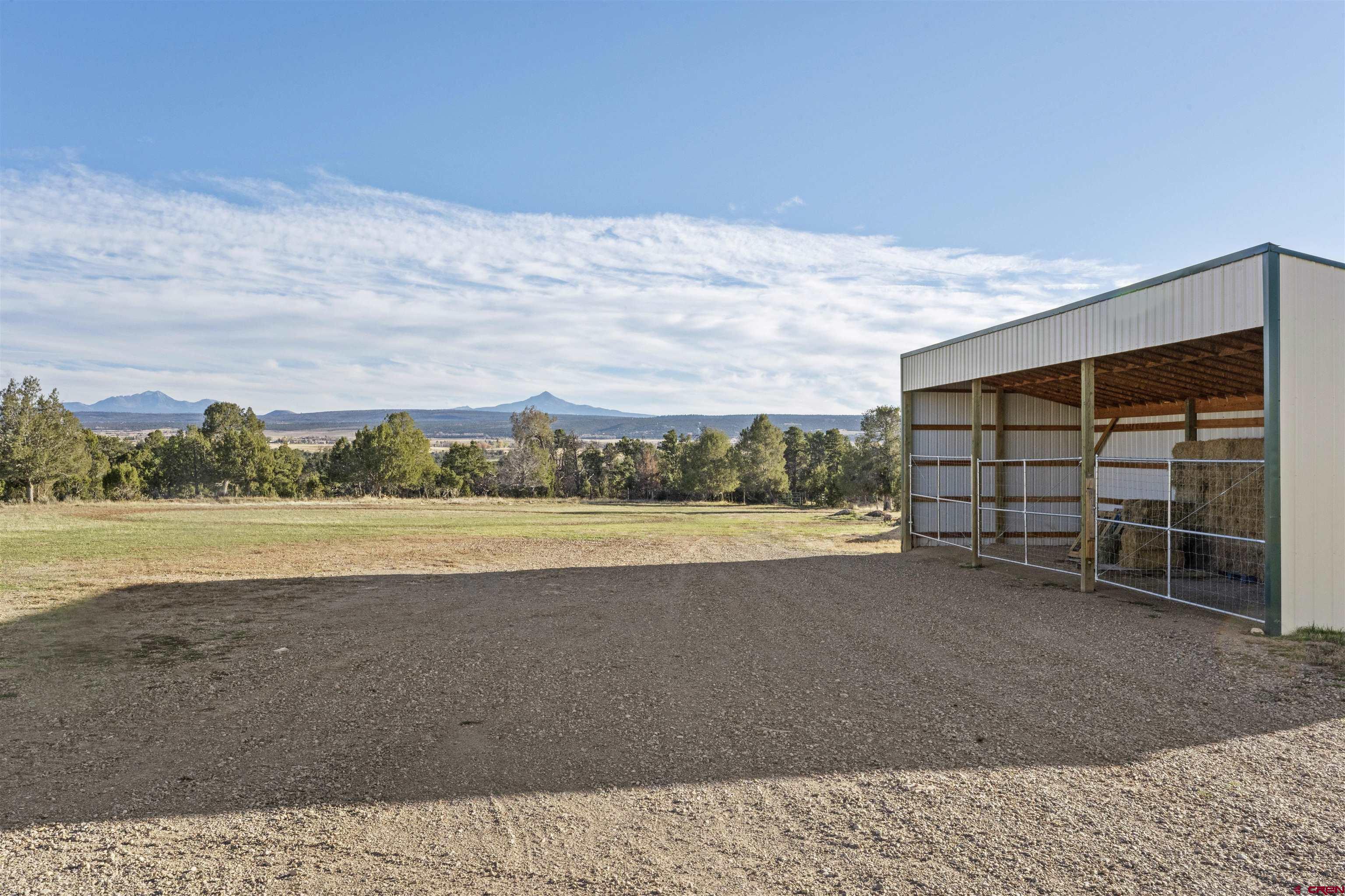 1302 42zn Road Norwood, CO 81423 - Photo 24 of 32 a view of an ocean and beach