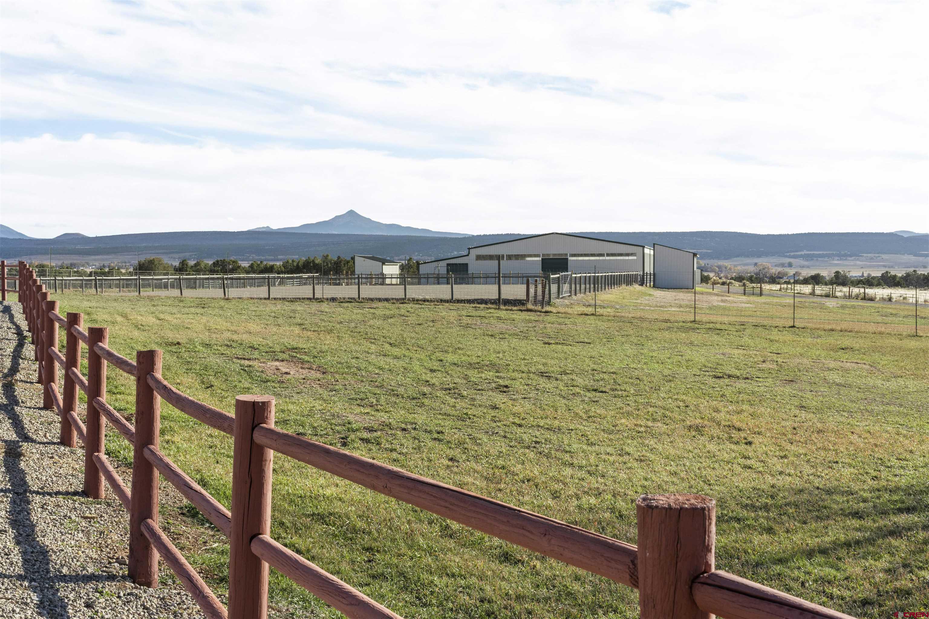 1302 42zn Road Norwood, CO 81423 - Photo 6 of 32 a view of an ocean from a balcony