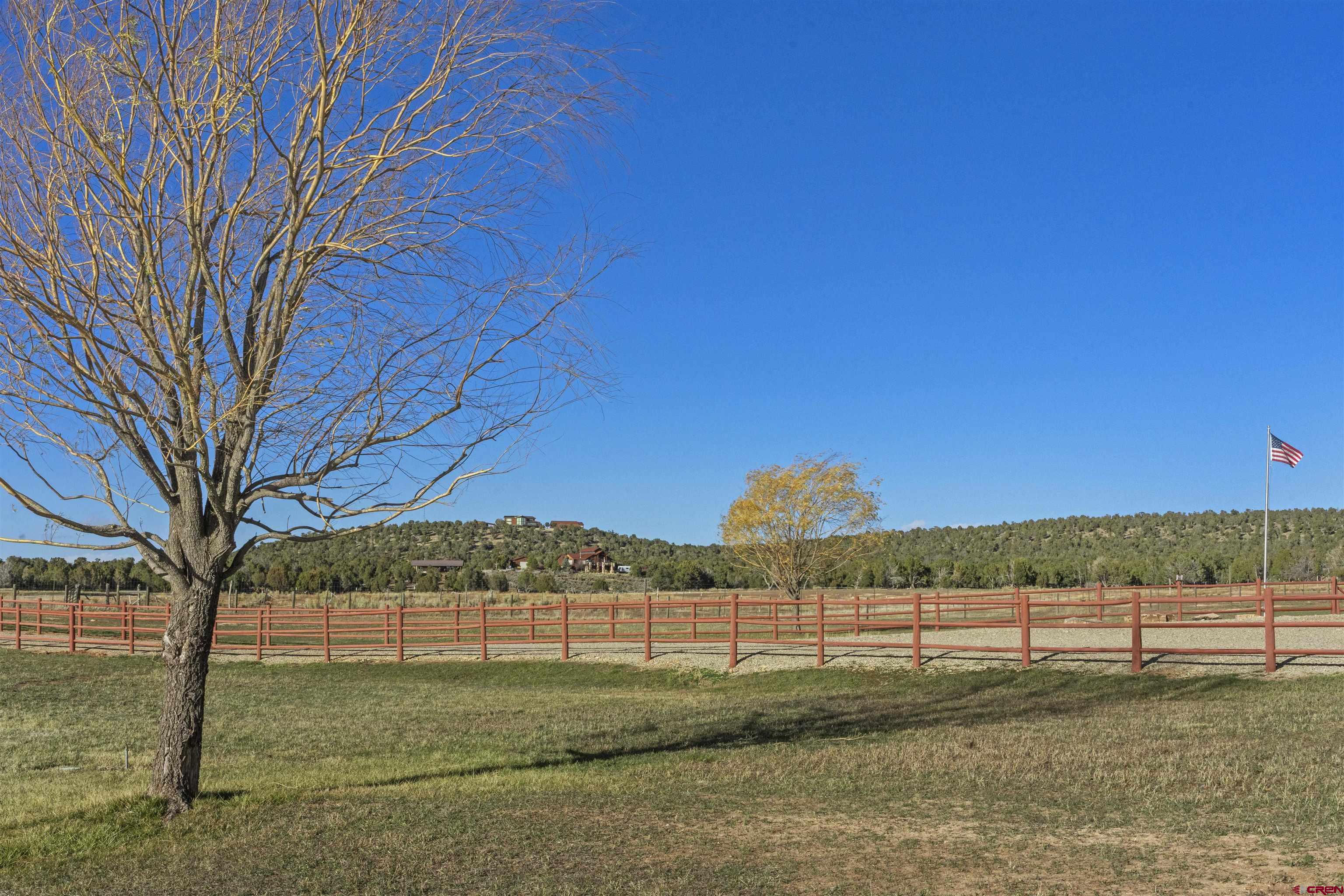 1302 42zn Road Norwood, CO 81423 - Photo 8 of 32 a view of a lake with houses