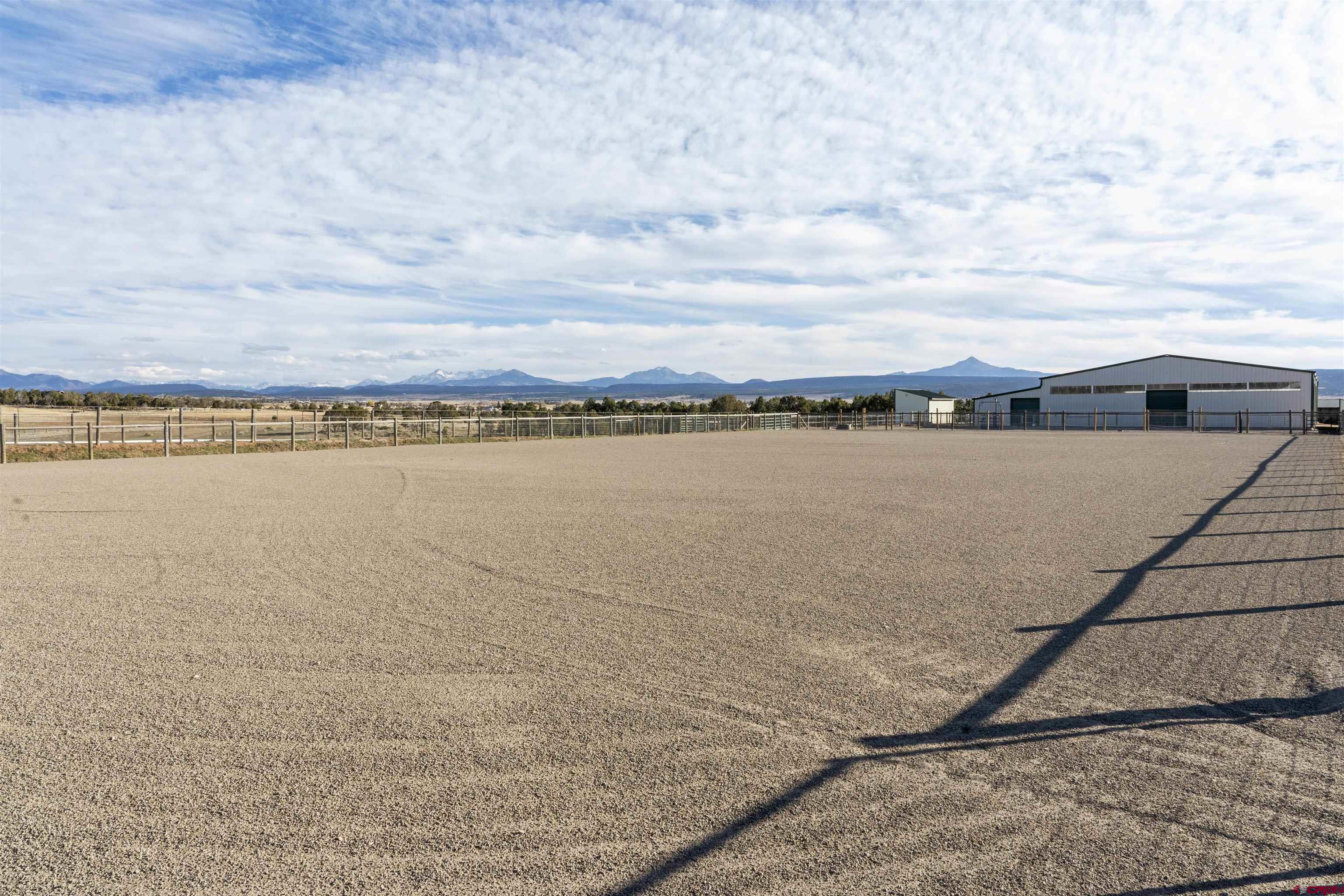1302 42zn Road Norwood, CO 81423 - Photo 10 of 32 a view of a lake next to a beach