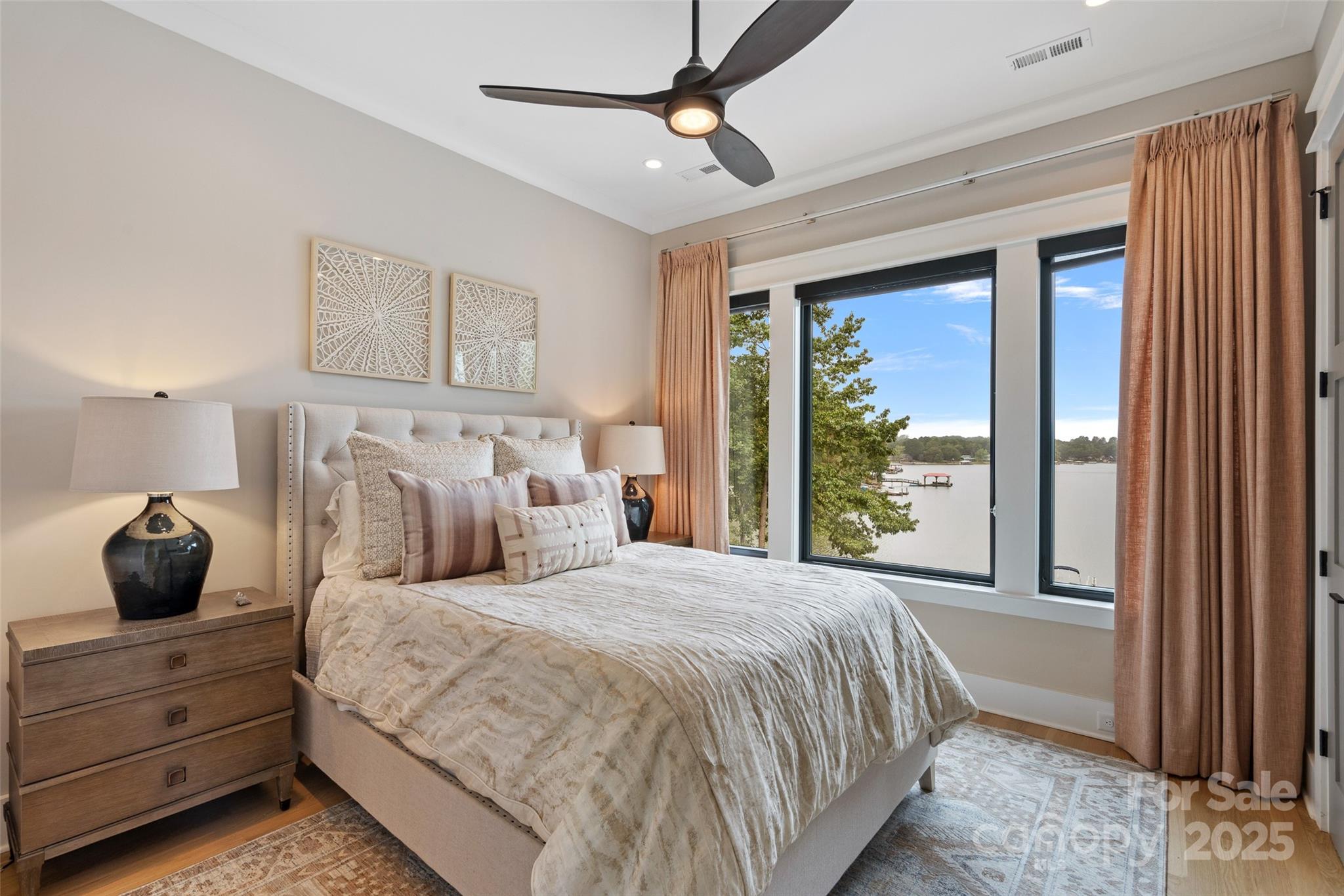 505 Kemp Road Mooresville, NC 28117 - Photo 15 of 38 a bedroom with a large bed and a window