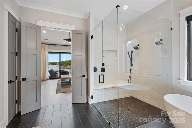 a bathroom with a shower and a sink