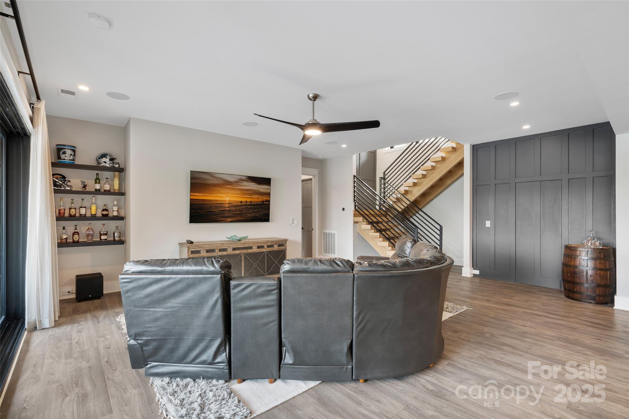 505 Kemp Road Mooresville, NC 28117 - Photo 22 of 38 a living room with furniture and a flat screen tv