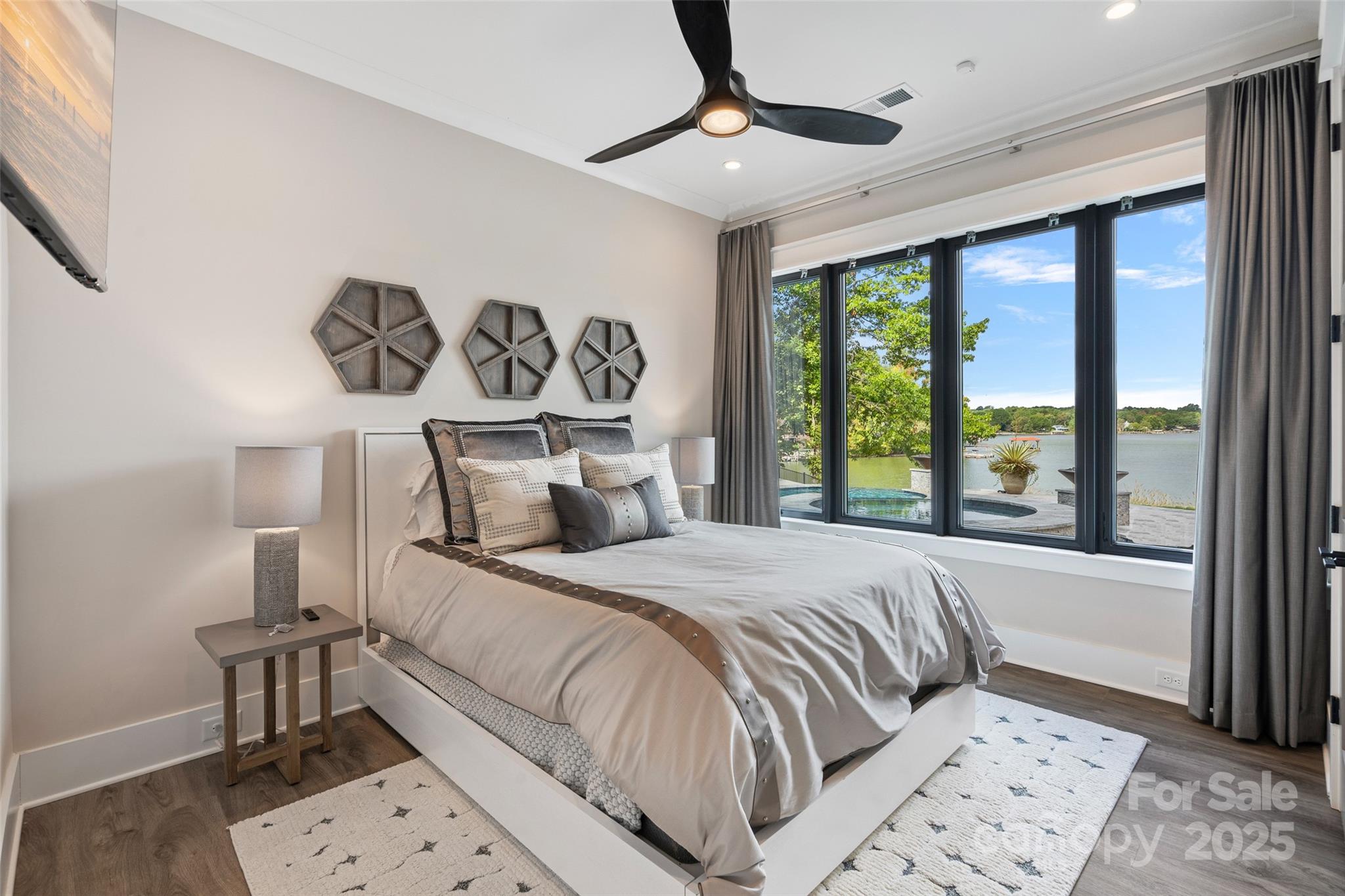 505 Kemp Road Mooresville, NC 28117 - Photo 26 of 38 a bedroom with a large bed and a window