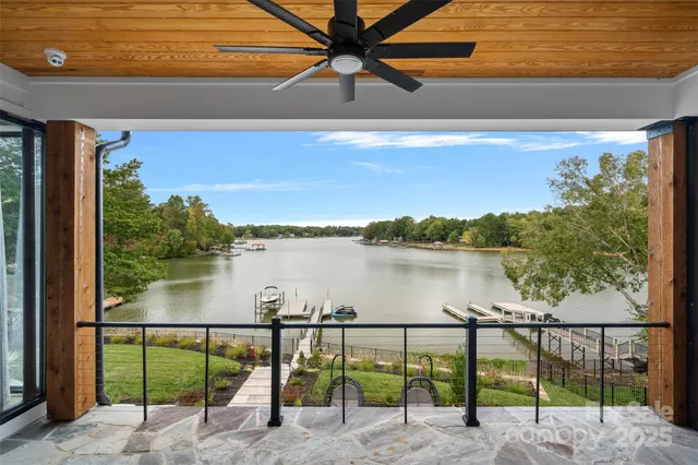 a view of a lake from a balcony