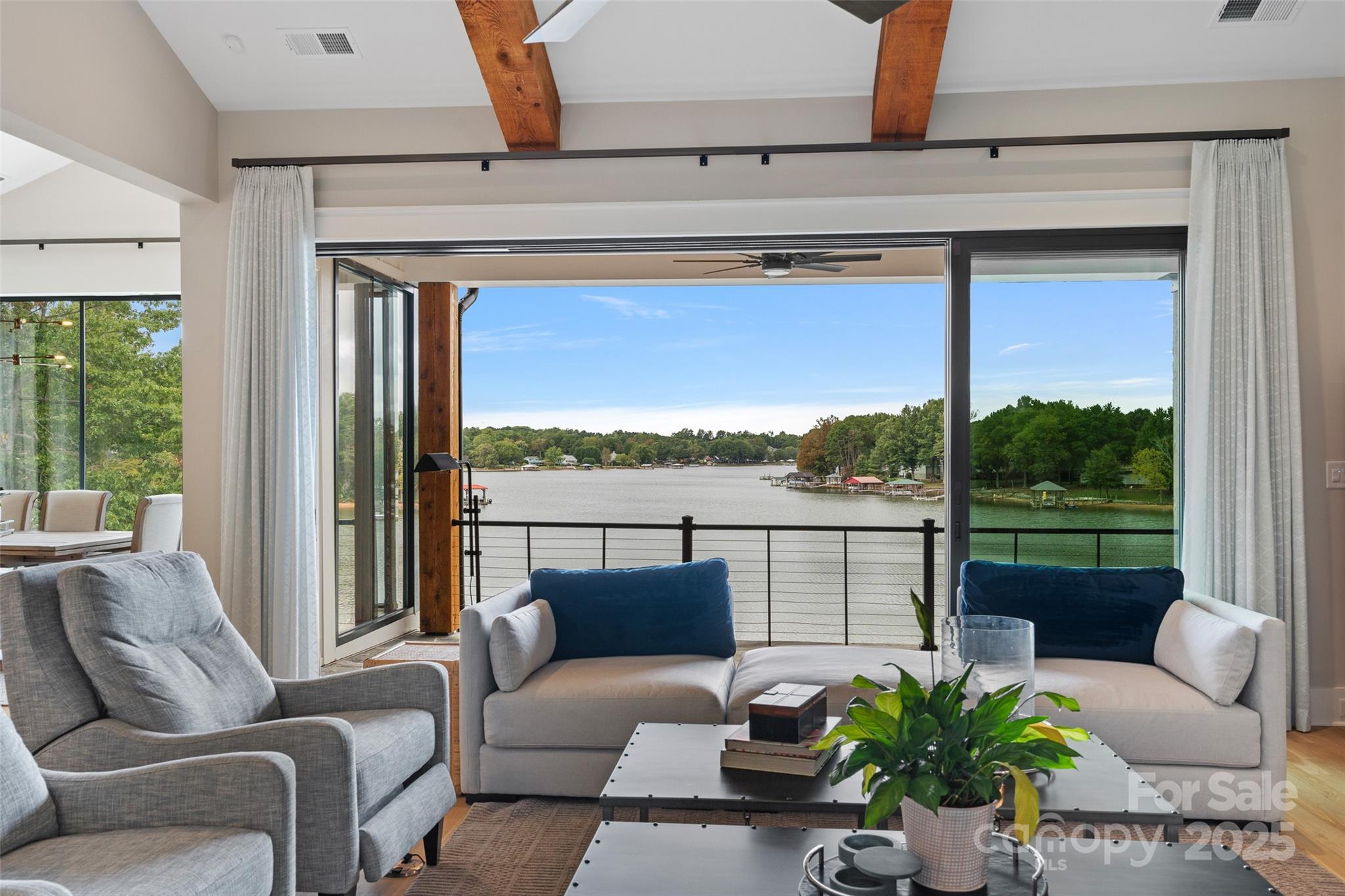 505 Kemp Road Mooresville, NC 28117 - Photo 8 of 38 a living room with furniture tv and a window