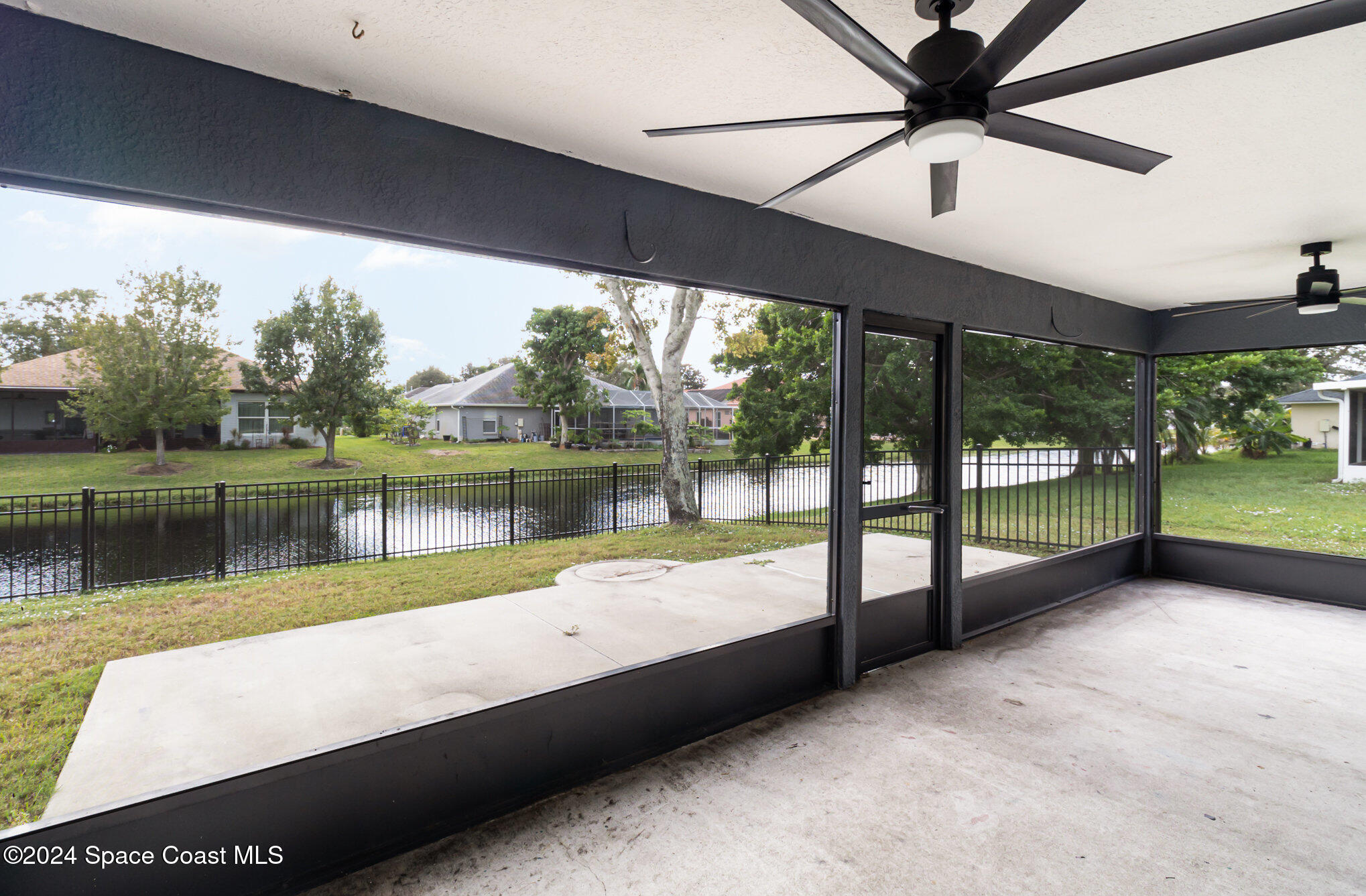 1223 Winding Meadows Road Rockledge, FL 32955 - Photo 21 of 27 a view of a lake