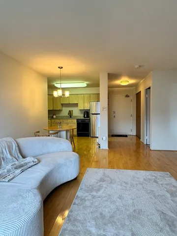a swimming pool with a table and chairs