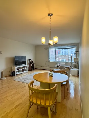 a bathroom with a sink toilet and mirror