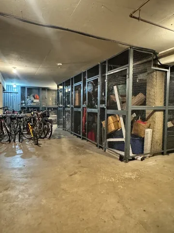 a view of street with parked cars