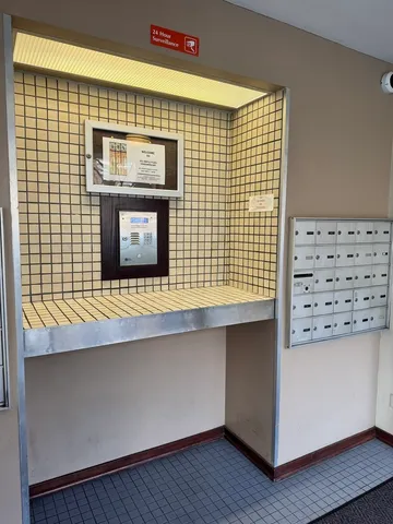 a kitchen with a sink and a refrigerator