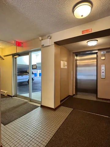 a view of a livingroom with wooden floor
