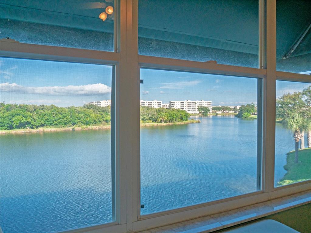 6401 99th Way North, Unit 15C St. Petersburg, FL 33708 - Photo 23 of 48 a view of a lake view