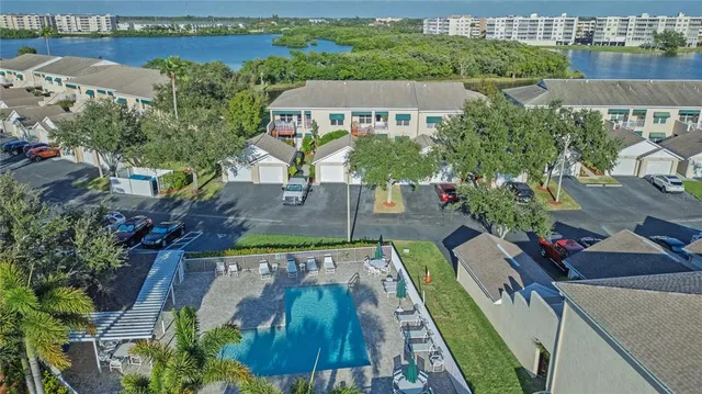 an aerial view of a house with outdoor space