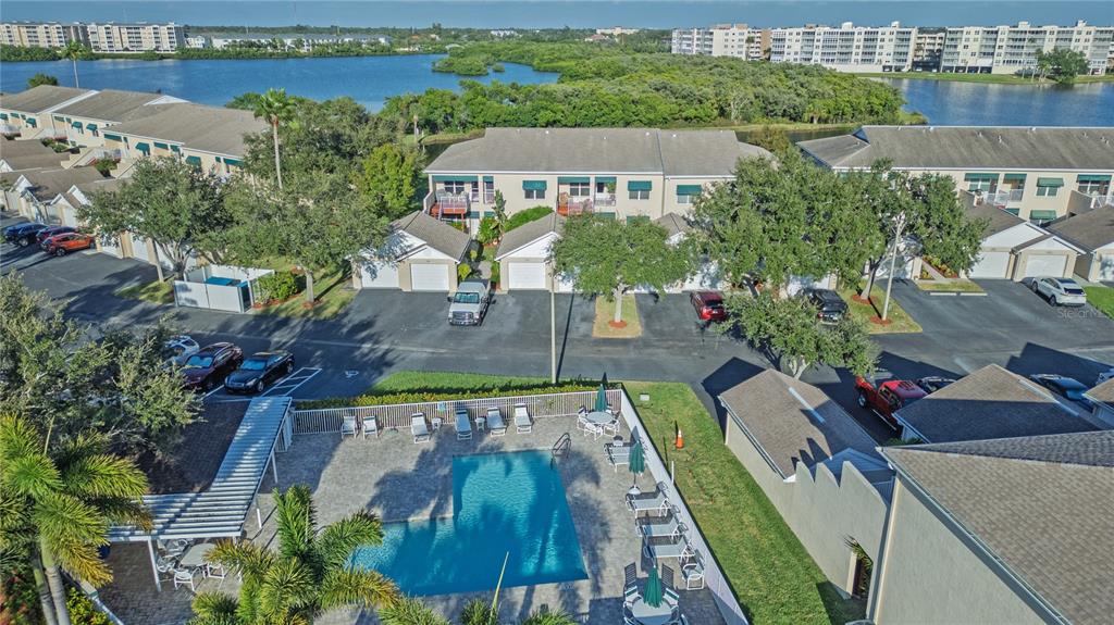 6401 99th Way North, Unit 15C St. Petersburg, FL 33708 - Photo 35 of 48 an aerial view of a house with outdoor space