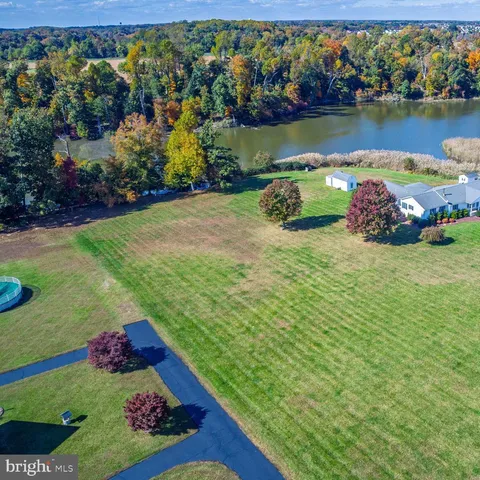a garden view with a lake view
