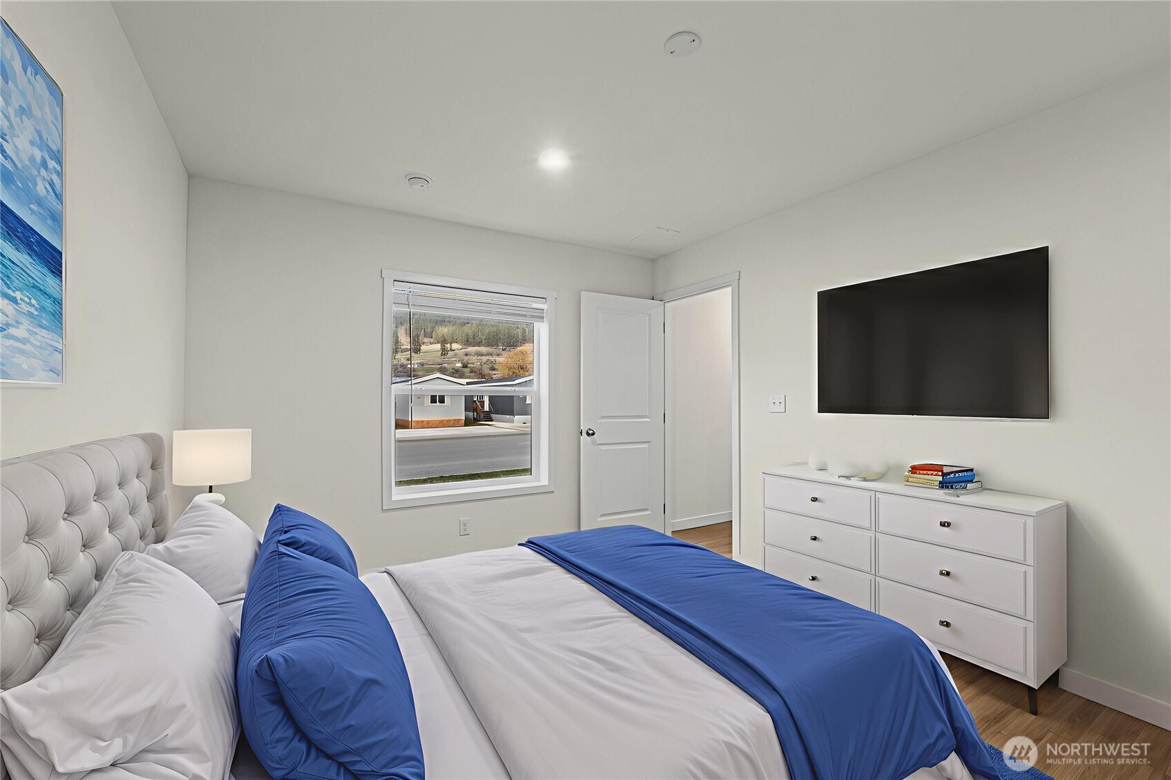 793 North Carter Street Colville, WA 99114 - Photo 6 of 19 a bedroom with a bed and a flat screen tv