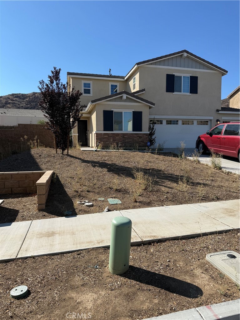 a house view with a outdoor space