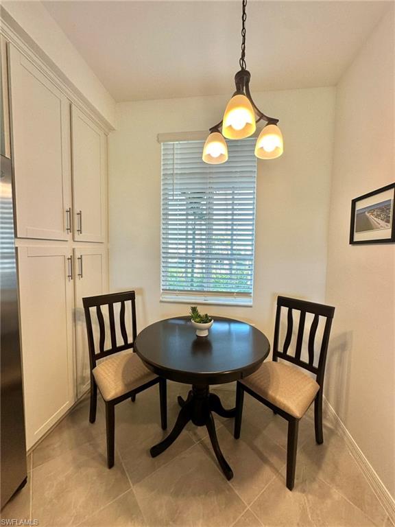 43985 Boardwalk Loop, Unit 2115 Babcock Ranch, FL 33982 - Photo 11 of 42 a view of a livingroom with furniture and a window