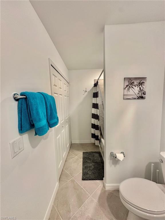 43985 Boardwalk Loop, Unit 2115 Babcock Ranch, FL 33982 - Photo 20 of 42 a bathroom with a toilet and shower