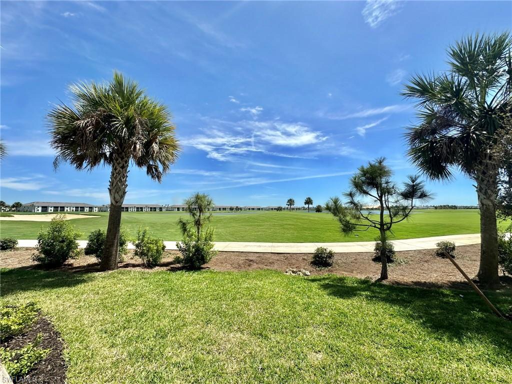 43985 Boardwalk Loop, Unit 2115 Babcock Ranch, FL 33982 - Photo 22 of 42 a view of a park with large trees