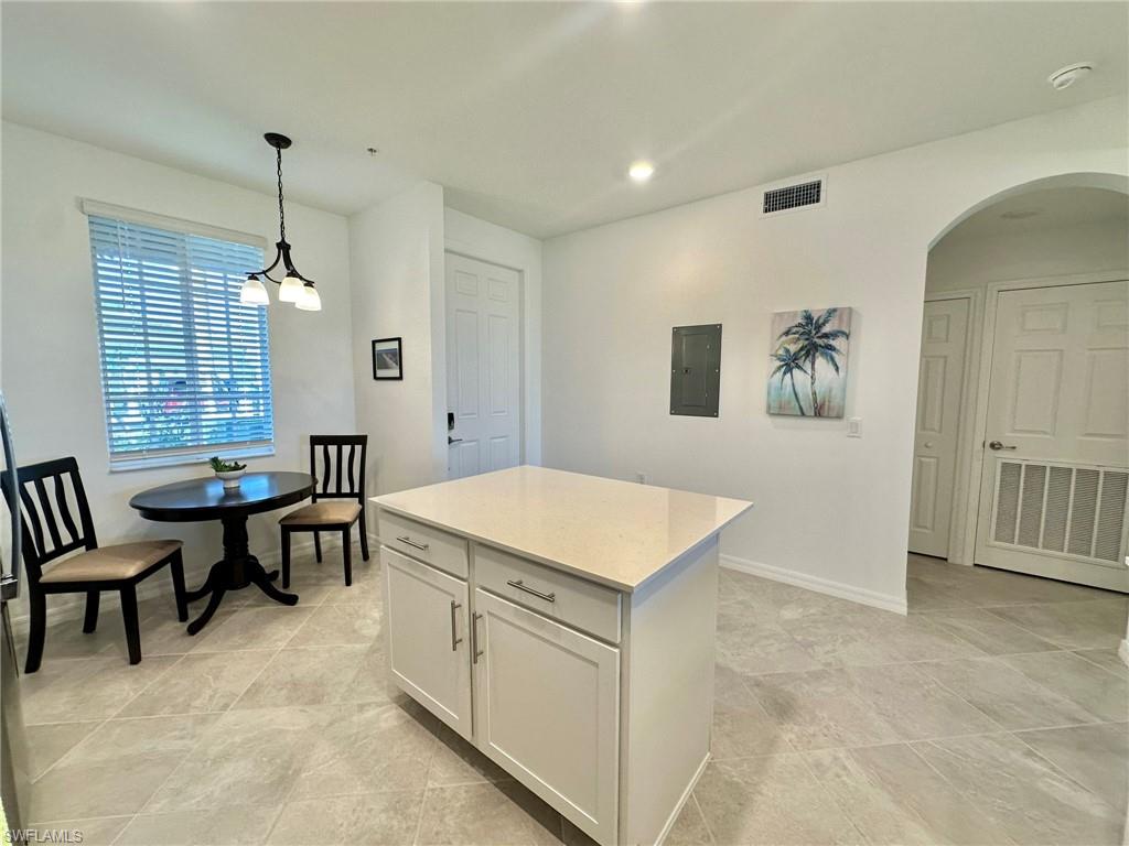 43985 Boardwalk Loop, Unit 2115 Babcock Ranch, FL 33982 - Photo 10 of 42 a view of a livingroom with furniture and window