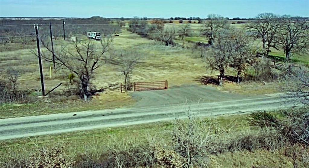 250 County Road 427 Rising Star, TX 76471 - Photo 3 of 24 a view of a grassy area with an trees