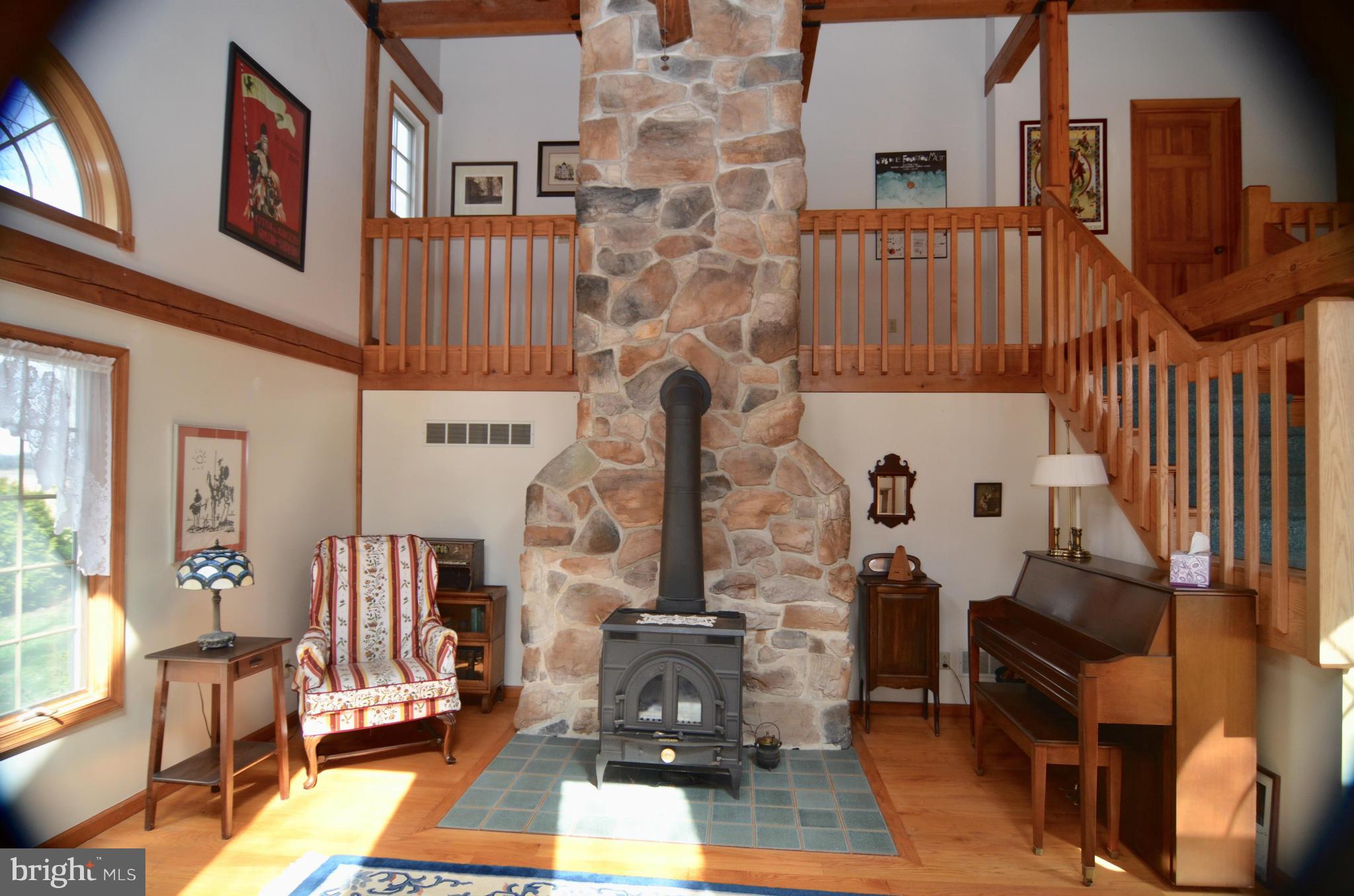 498 Pear Tree Point Road Chestertown, MD 21620 - Photo 19 of 30 Living room with stone fireplace