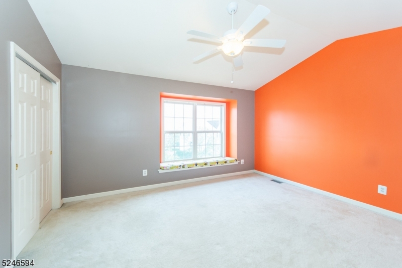551 Coventry Drive Nutley, NJ 07110 - Photo 15 of 22 an empty room with a window
