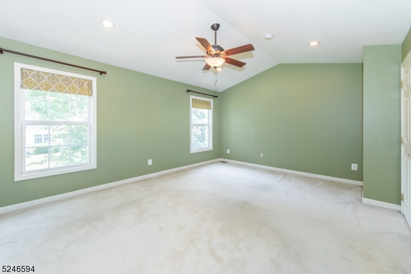 551 Coventry Drive Nutley, NJ 07110 - Photo 17 of 22 a view of a livingroom with a ceiling fan and window