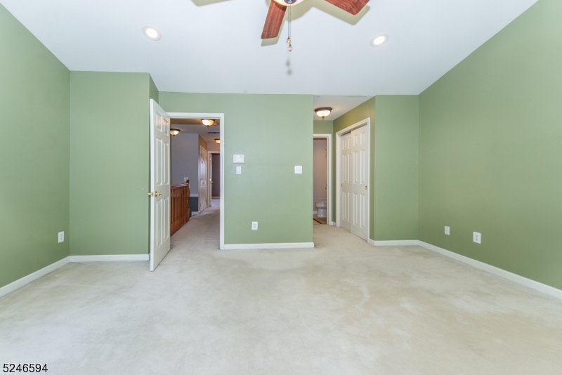 551 Coventry Drive Nutley, NJ 07110 - Photo 19 of 22 an empty room with closet and windows