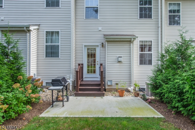 551 Coventry Drive Nutley, NJ 07110 - Photo 2 of 22 a view of a house with backyard and sitting area