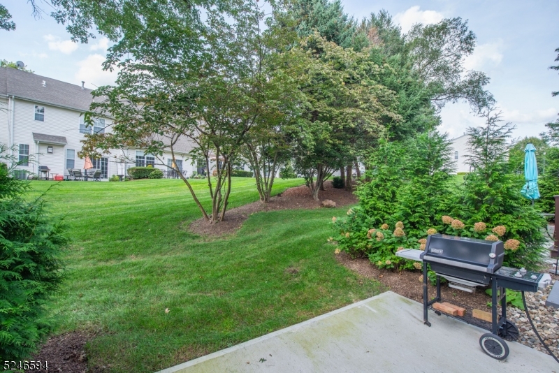 551 Coventry Drive Nutley, NJ 07110 - Photo 4 of 22 a view of a backyard with sitting area